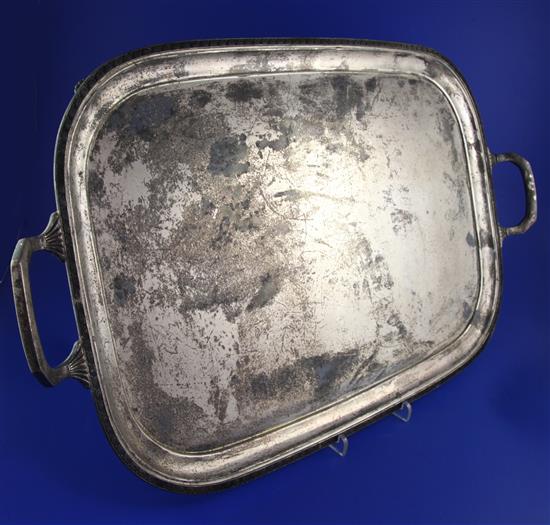 A George V silver two handled tea tray by Mappin & Webb, 88 oz.